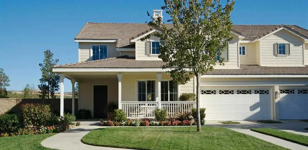 Front view of a beautiful house with grass